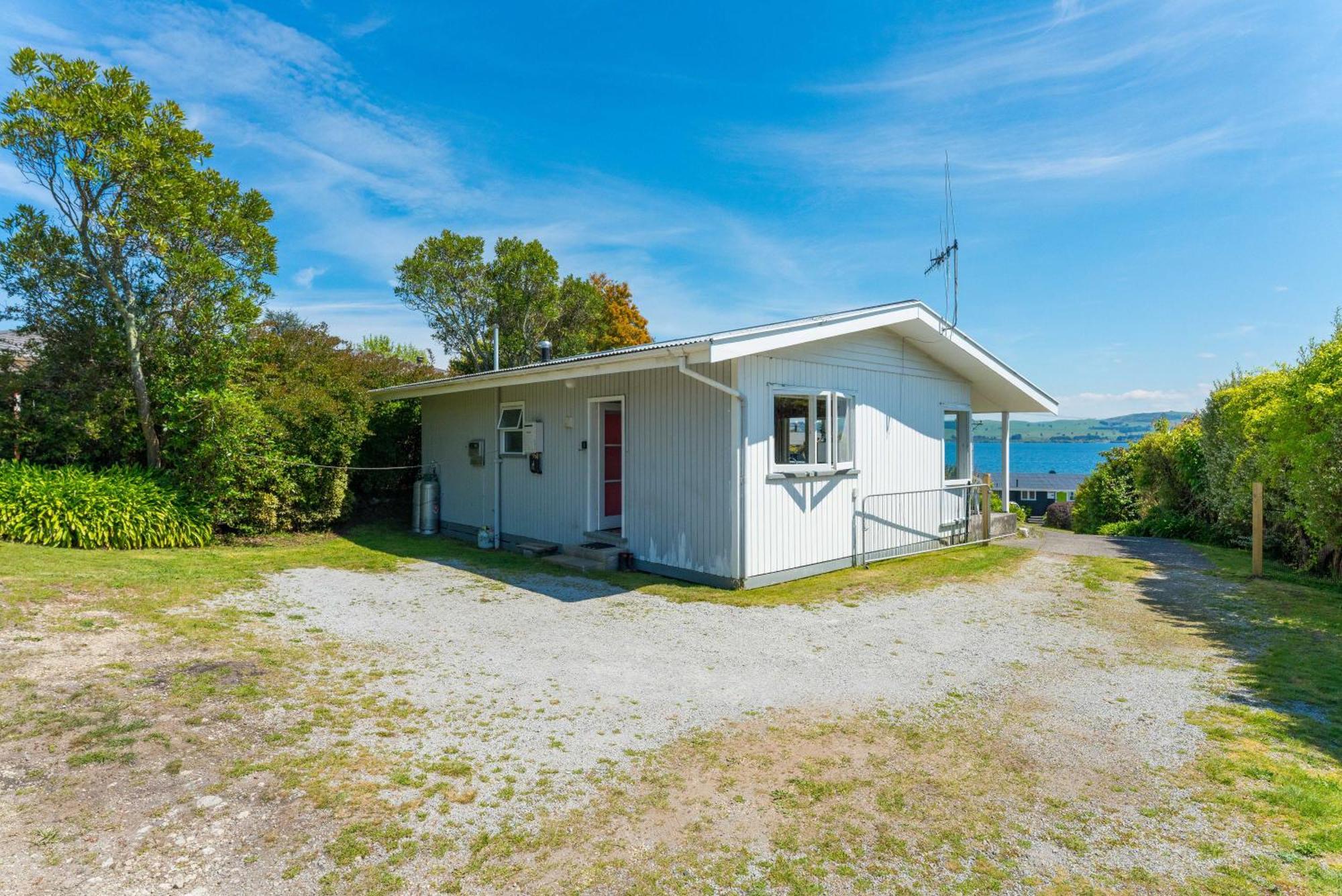 Lakeview Cottage - Rainbow Point Holiday Home Lago Lago Taupo Esterno foto