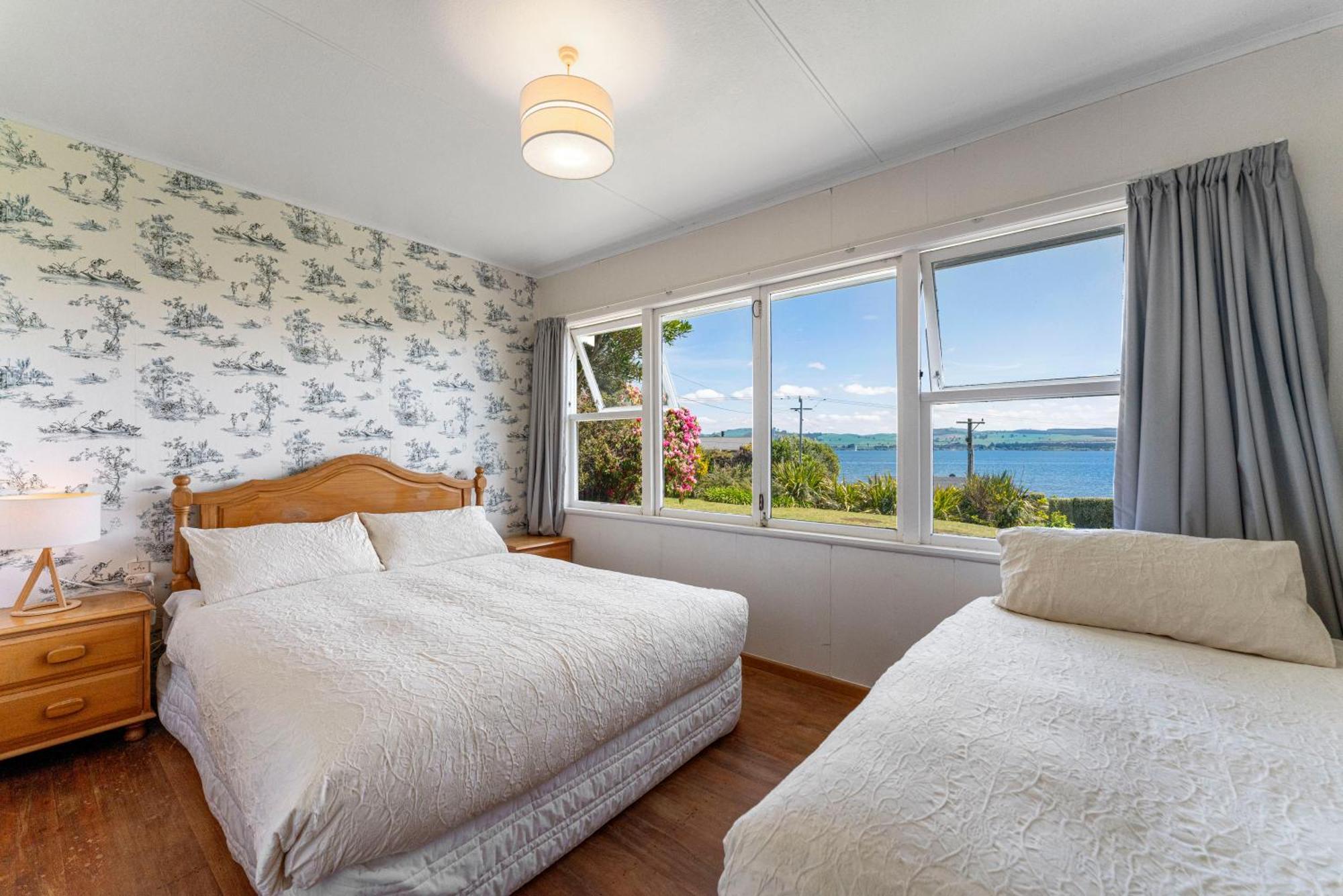 Lakeview Cottage - Rainbow Point Holiday Home Lago Lago Taupo Esterno foto